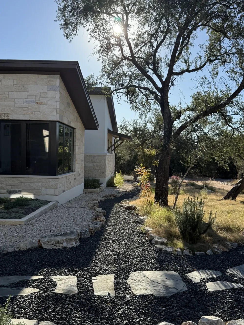 Native lawn, stone paths and established trees
