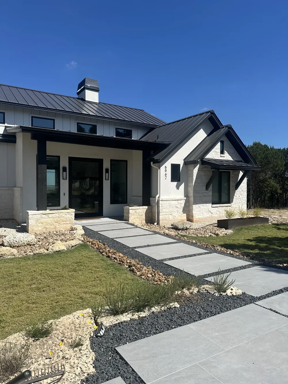 Stone paths and planting leading to a home