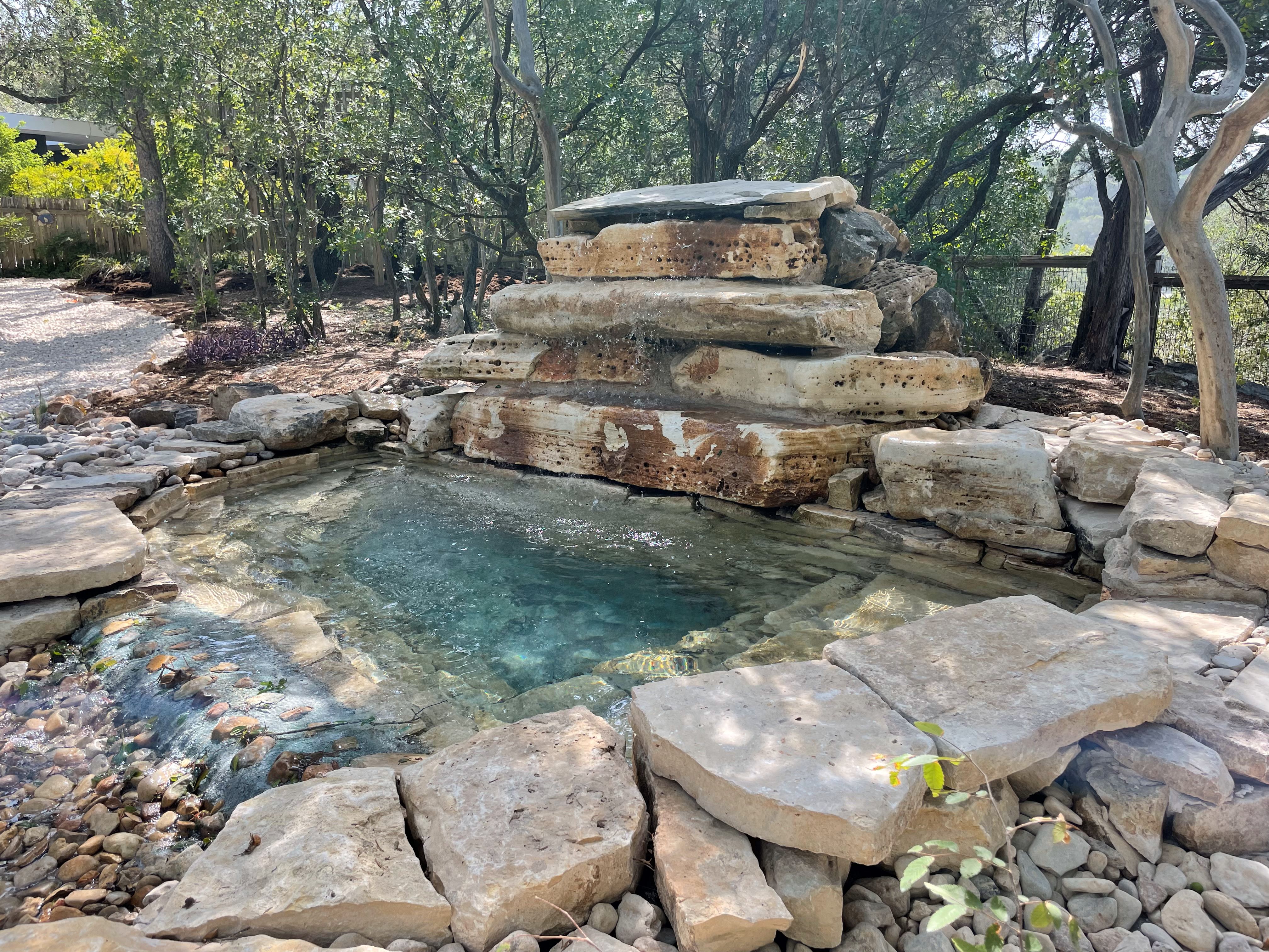 Boulder waterfall at a swim spa